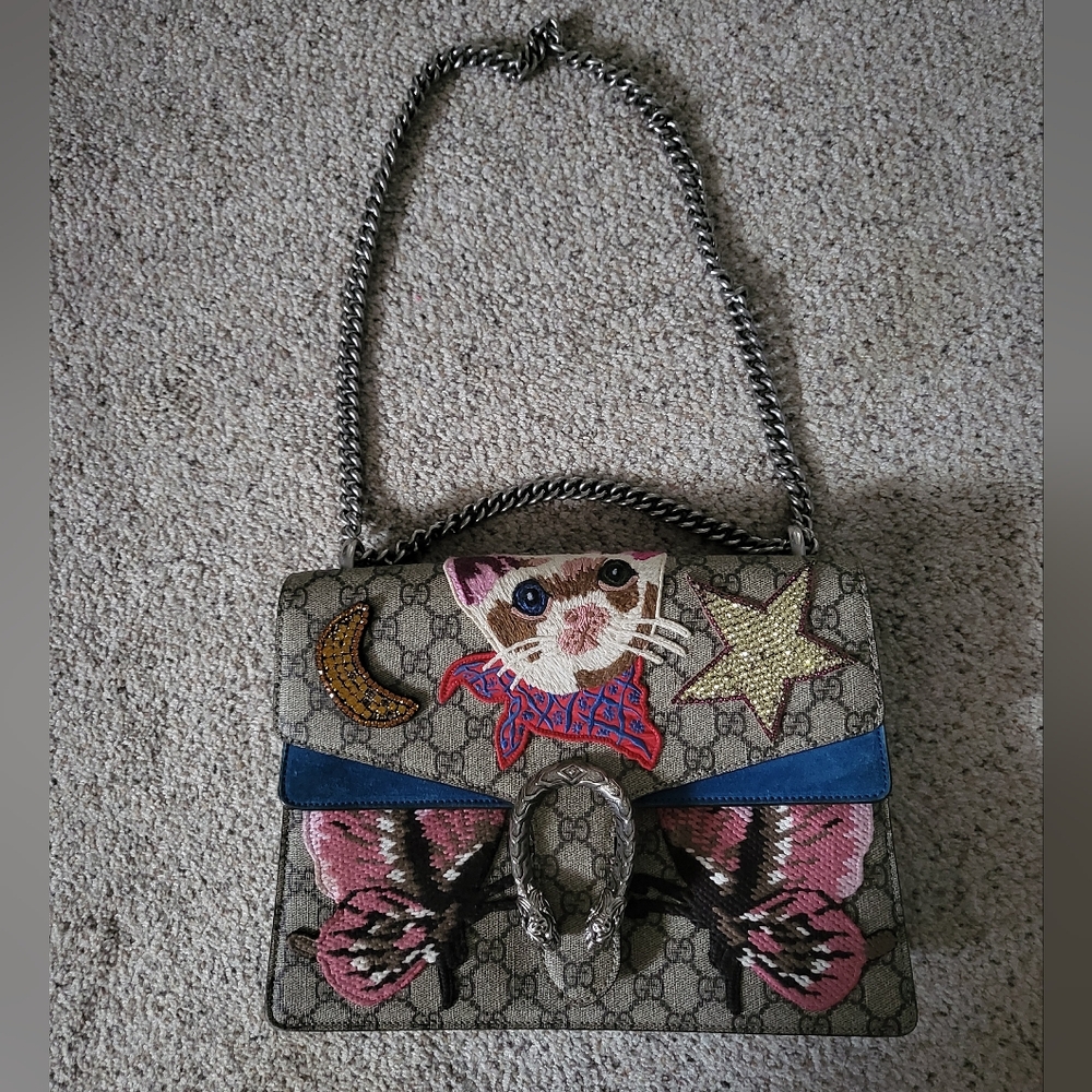 Gucci Monogram purse